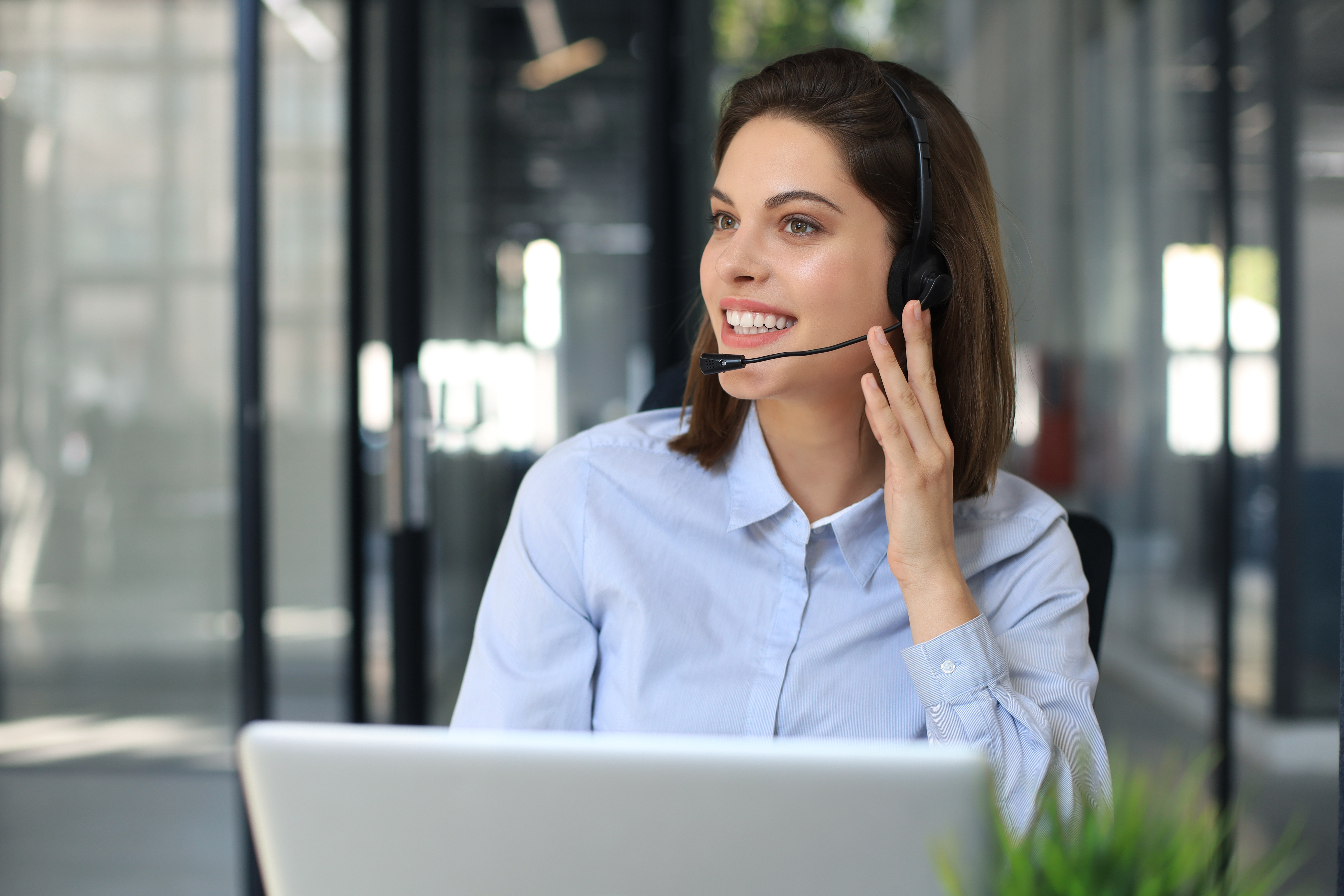 Customer support executive ready to handle messaging conversations